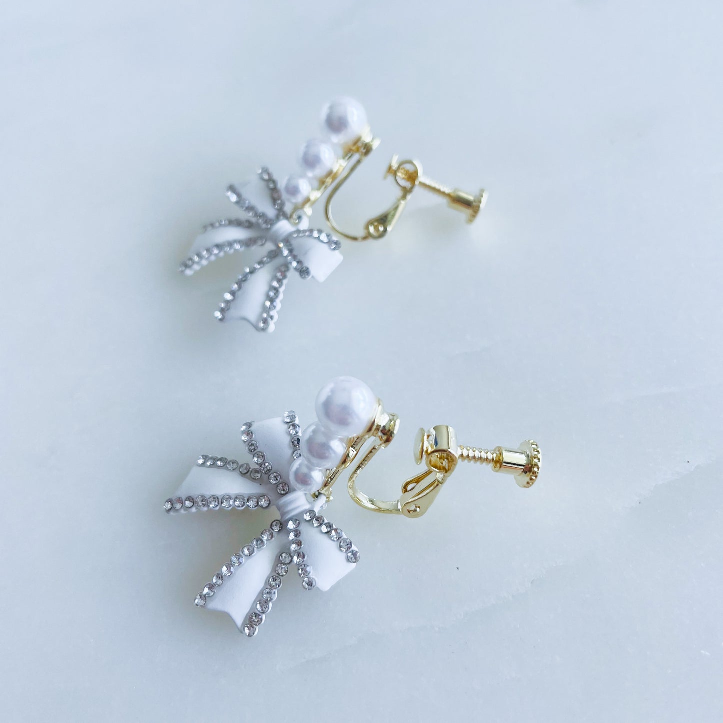 White Knot Ear Clips